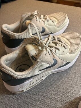 Green & white Nike Air Force Excee Women’s Running Sneakers